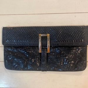 Bags by Jean Varon. Black snakeskin clutch /shoulder bag.